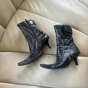 Black leather moto style ankle boot with kitten heel and pointed toe